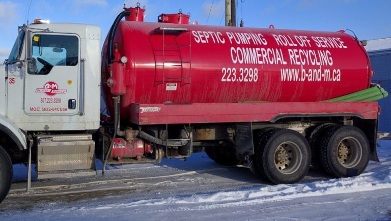 B and M Delivery Septic pump truck.